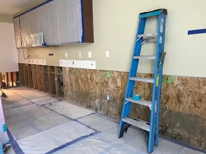 Drywall cut above the wet line with a ladder and protected floor